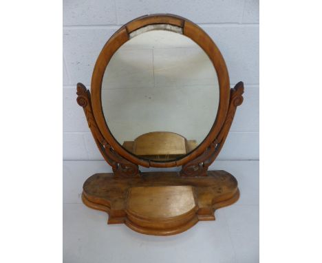 Oval Rosewood mirror with small lidded central compartment