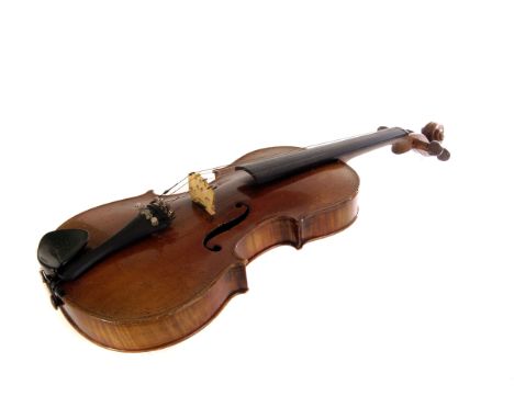 An 18th century German violin, bearing label to inside 'Antonius Stradiuarius Cremonenlis Faciebat Anno 1735 with bow in hard