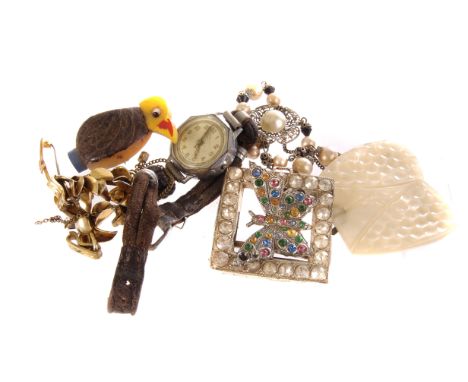 A collection of jewels and watches, comprising belt buckles, simulated pearl necklace, a vintage gent Elbaro wrist watch, bro