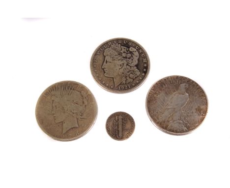 Four vintage US coins, comprising a 1921 Morgan Head dollar, F, a 1923 Liberty Head dollar, F/VF, a 1928 Liberty Head dollar,