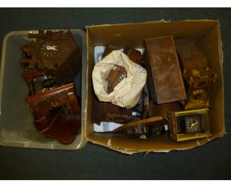 A large collection various clocks and clock parts, including a cuckoo clock, a Dutch Zamdan, mantle clocks and more, in three