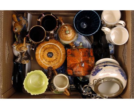 A graduated set of the Poole pottery dolphin figures, together with two German pottery vases, a selection of ceramic teapots 