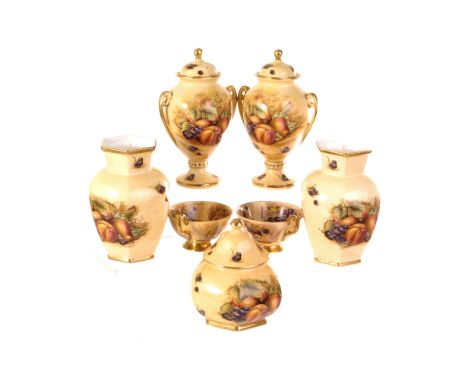 A collection of Aynsley fruit pattern ceramics, to include vases and covers, cups and saucers, plates and more, plus a select