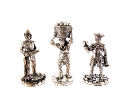 A collection of modern British miniature, all of different professions, including Fireman, Clock Maker, Chimney Sweep, Baker 