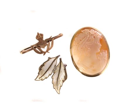 A 9ct rose gold sweetheart brooch, together with a cameo brooch in 9k marked mount, and a pair of enamel and silver clip on e