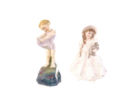 A Royal Doulton 'Here A Little Child I Stand' porcelain figure, HN1546, together with a Royal Worcester figure 'Lucy' (2)
