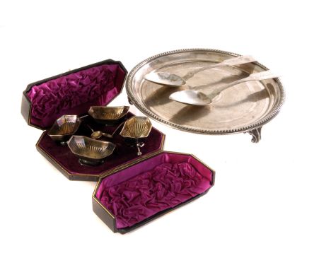 A silver plated charger, with engine turned design, together with a cased set of four salts, and a selection of various silve