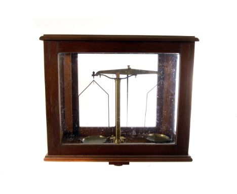 A mahogany and glazed case set of scientific scales, by W&T Avery of Birmingham, plus an incomplete set of small graduated we