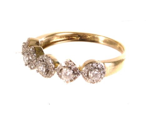 A 10K gold and diamond five cluster ring, the five clusters of diamonds forming 1/2ct, size N, approx 2.8g