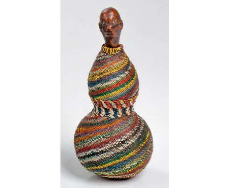 nhunguvani&nbsp;Shaped calabash (gourd), covered with coloured electrical wire in turning angled stripes, carved wooden stopp