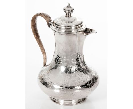 Hinged cover with knob finial, the body chased with scrolls and foliage, woven wicker covered handle, on a circular spreading