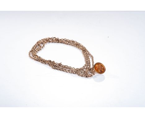 Composed of cable-link chain suspending a fob seal mounted with an intaglio-carved gemstone, approximately 160cm in length