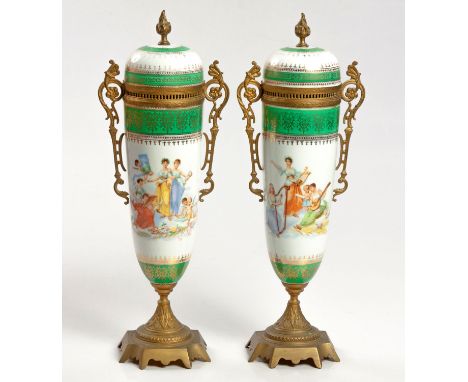 Each elongated body handpainted by Carl Larsen with scenes of maidens and cherubs at various pursuits between bands of green 