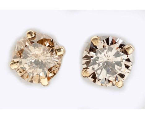 Each claw set with a round brilliant-cut light-brown diamond weighing approximately 0.68ct in total, in 18ct gold (2)