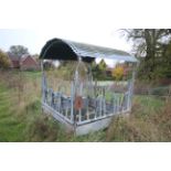 Skid mounted big bale feeder. With roof. Included by kind permission. V