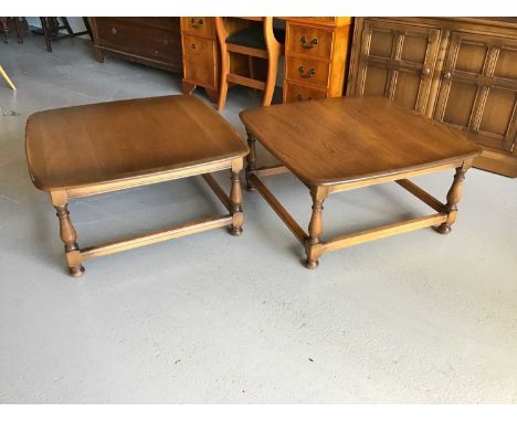 Pair of Ercol elm coffee tables on turned legs joined by stretcher H38.5cm W75cm D75cm