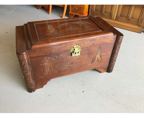 Eastern carved camphor wood trunk with brass lock H48cm W90cm D47cm