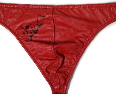 A red leather thong, as worn by Tom Wilkinson in the film The Full Monty and signed by him, together with a signed note confi