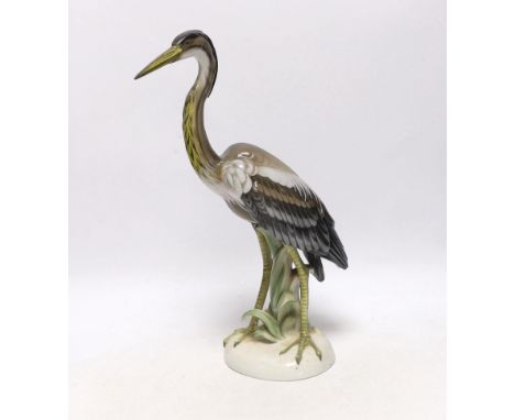 A Rosenthal porcelain Chinese heron modelled by H. Meisel, 36cm high (a.f.) Heron has been glue re-attached around bocage ste