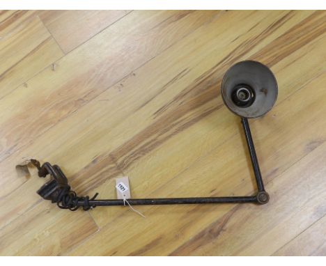 A Kandem model 802 adjustable lamp with clamp, 94cm high (fully extended)