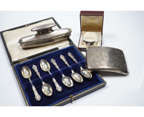 A George V engraved silver mounted nail buffer with cover, Birmingham, 1928, 14.9cm, together with a silver cigarette case, a