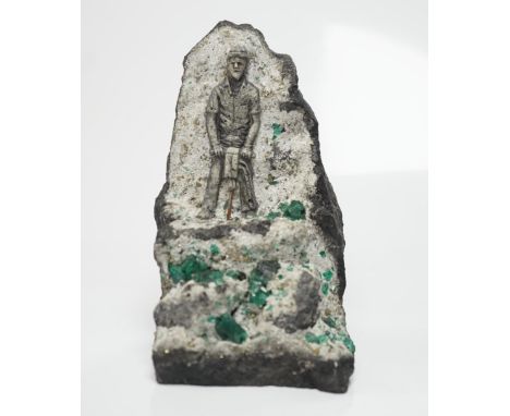 An iron pyrites and emerald? crystal figural geode sculpture, 14cm