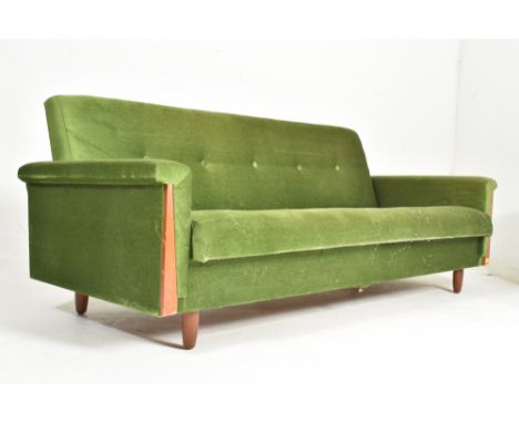 Danish Modern Design - a retro mid 20th century teak framed &amp; velvet upholstered three setaer sofa bed. The sofa having a
