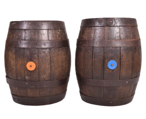 Wadworth Devizes - a pair of wooden and metal bound coopered beer barrels / side lamp tables. Each of typical form with red f