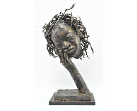 J. Flavius - a vintage likely continental bronzed resin scultpure of a head resting on hand. The head with wire mesh braided 