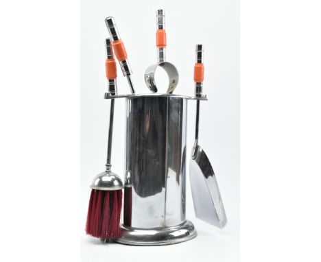 A vintage 1930s Art Deco chrome fireside suite / companion set. The set is comprised of hearth brush, fire poker, tongues / l
