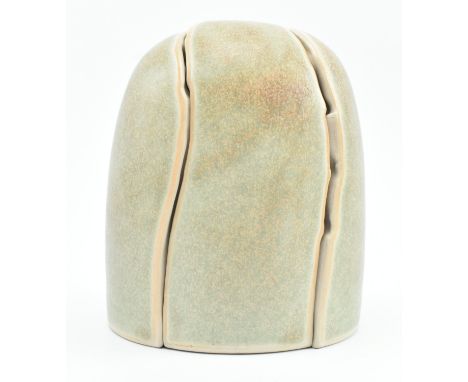 An unusual Contemporary studio art potter three-part metamorphic sculpture feature. The piece of half-dome form made up of th