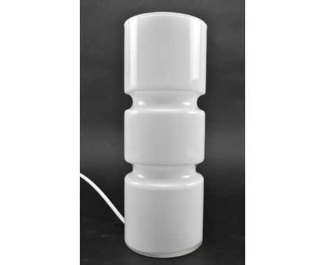 Habitat - a contemporary Habitat Fitz cased glass table lamp. The desk light in a white colourway of cylindrical form.Measure