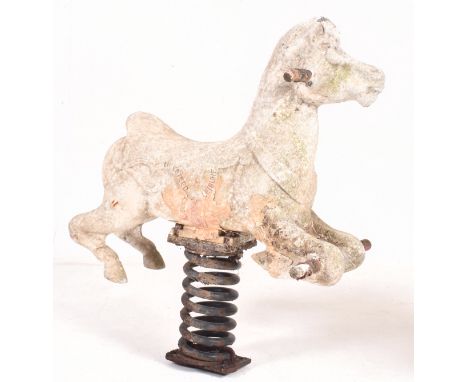 Wicksteed Leisure - a vintage 20th century fairground / playground horse. Raised on a spring base with makers' marks to the s
