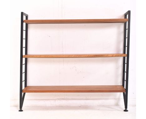 A retro 20th century 1970s teak and metal single-bay modular wall unit. Comprising of two black metal ladder uprights support