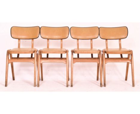 Centa - a set of four vintage 20th century beech &amp; leather stacking chairs. Each having a curved padded backrest over a p