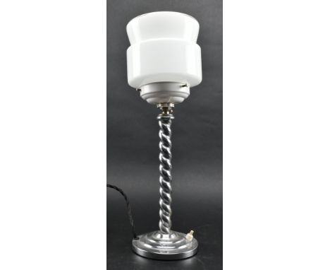 An Art Deco 20th century milk glass &amp; chrome desk table lamp light. The lamp having a shaped milk glass &amp; gilt detail