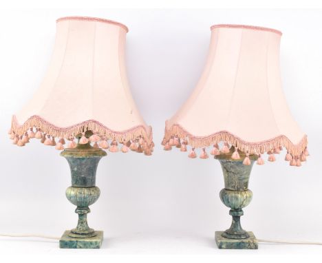 A pair of vintage kitsch Italian green marble bedside table lamps. Each lamp complete with original tapering pink shade with 
