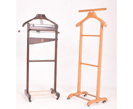 Two vintage mid century wooden gentleman's valet clothes horse stand. The lot comprising a mahogany Versatile Valet stand by 