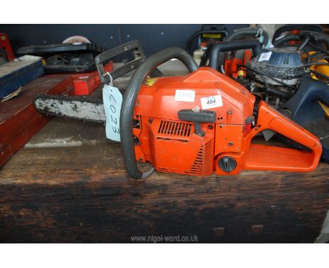 A Husqvarna 254 XP chainsaw, (good compression). sold as seen.