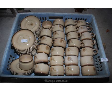 A quantity of Denby 'Memories' cups and saucers