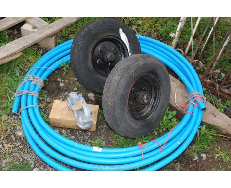 A trailer ball hitch coupling - Indespension units with 4.80 x 8 wheels and tyres and a quantity of blue polyurethane water p