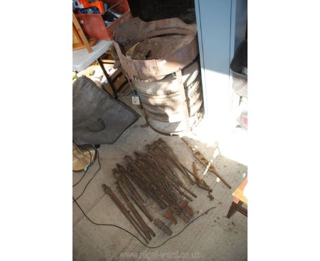 A Blacksmith's foot operated bellows with top forge and many tools.