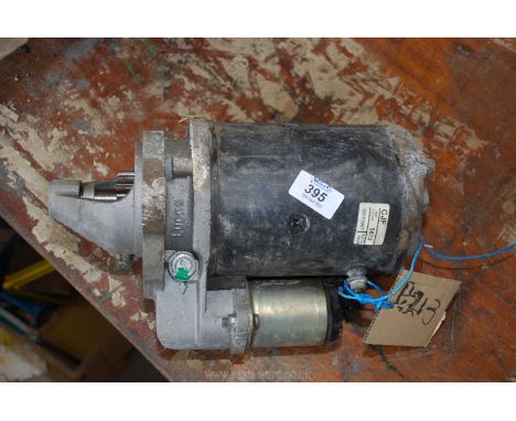 A Lucas starter motor.