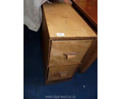 A ply board tool cabinet 10 3/4" W x 20 1/2" D x 24" H.