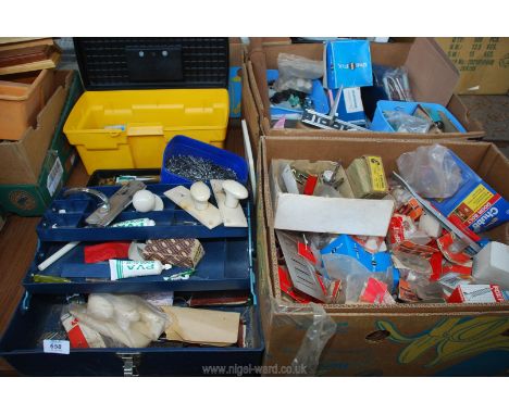 Two plastic tool boxes and two boxes of door fittings, screws, plugs, etc.