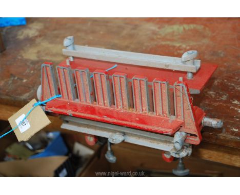 A dovetail bench mounted tool.