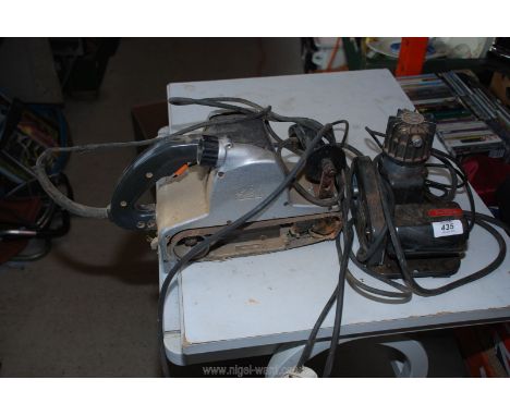 An Elu sander and a Sew-tric compressor, (both Sold as Seen).