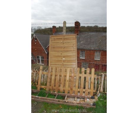 A wooden fence panel 36" x 6' and balustrade fence 70" x 31 1/2".