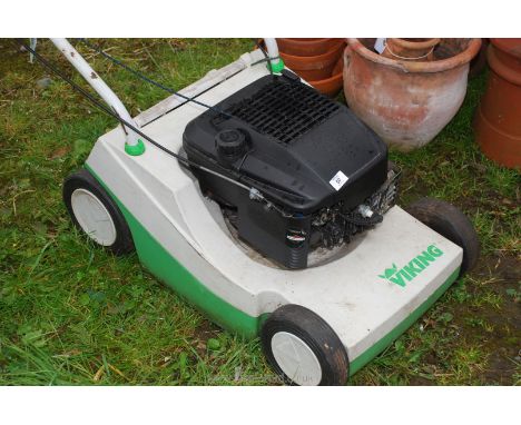 A Viking Briggs &amp; Stratton engine lawn mower, no grass box (running at time of cataloguing).