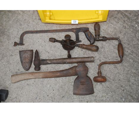 Old tools including hammer, drills, hacksaw etc.